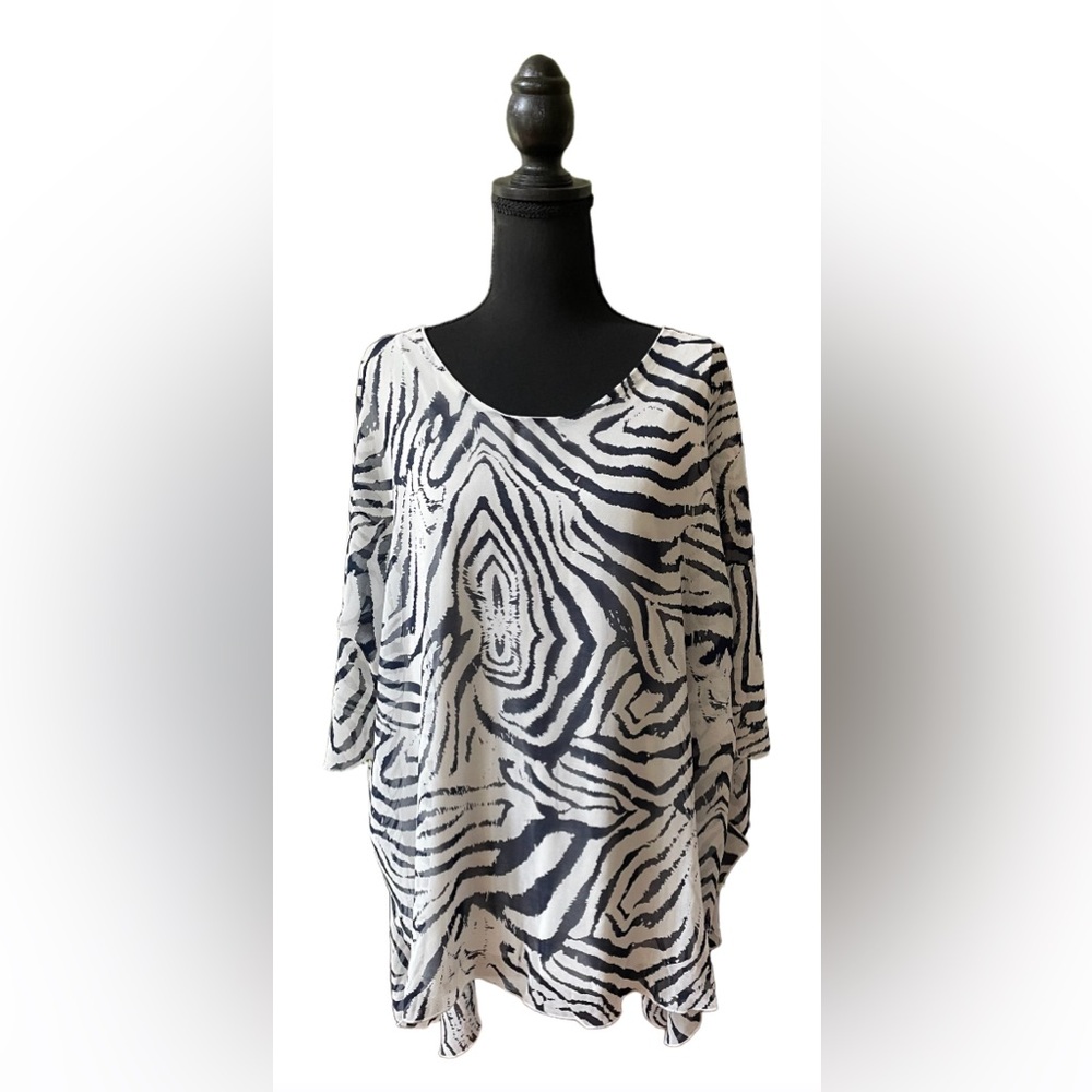 Simply Noelle: White and Black Animal Print Flowy Blouse